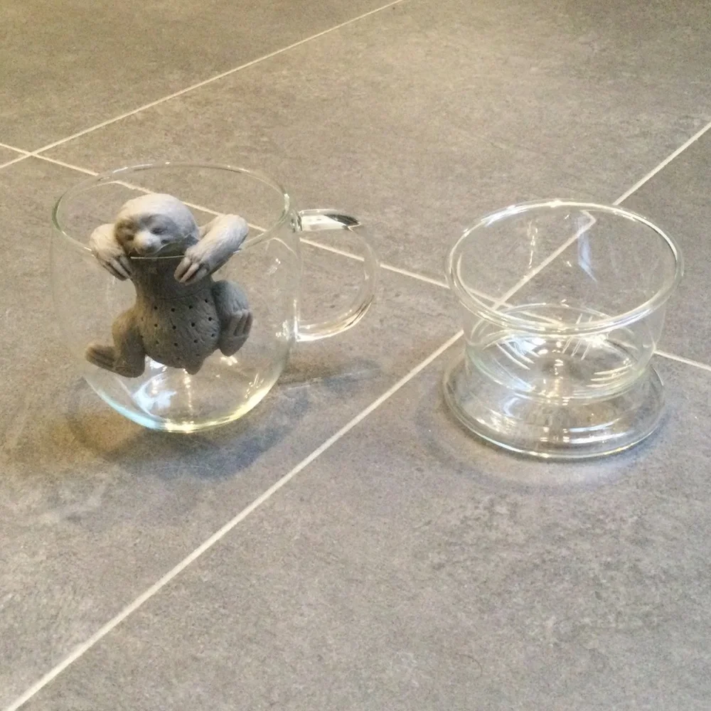 Glass tea mug and sloth slow brew infuser